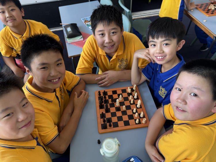 group of students playing chess