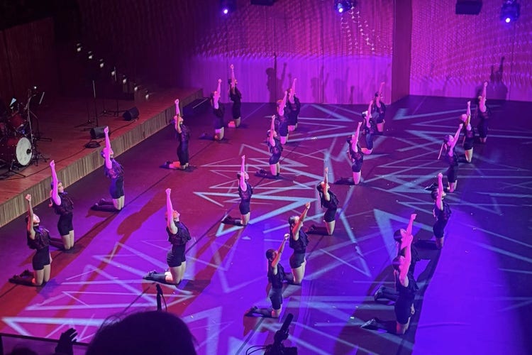 dance group performing on stage